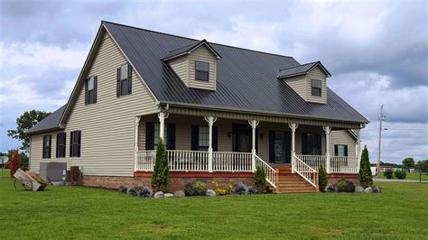 metal house sierra tan and dark grey roof|black metal roofing colors.